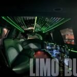 Green fiber optic ceiling and black leather seats inside 14-passenger SUV limo in Norfolk.