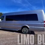 Side profile of the Mercedes Sprinter party bus, featuring sleek lines and tinted windows for ultimate privacy.