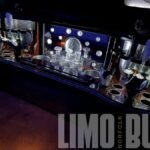 Crystal glassware and illuminated drink station inside Norfolk’s 22-passenger SUV limo.