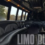 Premium seating and elegant design inside the 25-passenger Ford party bus shown during the daytime