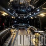 Luxurious interior of a 30-passenger party bus featuring black leather seating, ambient lighting, and a polished modern design.