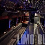 Spacious seating layout inside a 38-passenger party bus with premium lighting and luxurious design for Norfolk events.